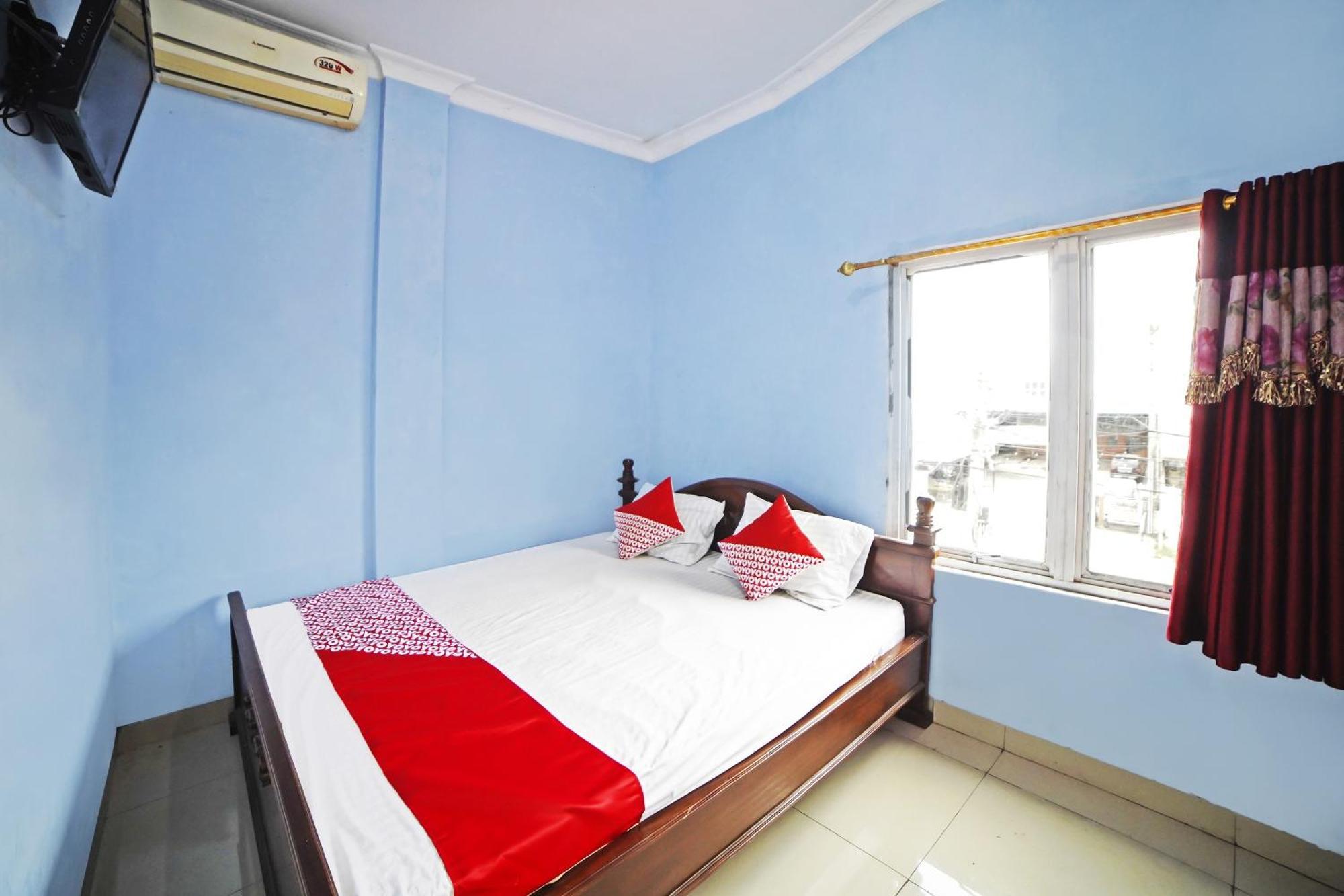 Oyo 90922 Gurusinga Guesthouse Медан Экстерьер фото